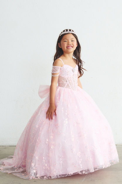On the Pink kids pageant dress, the detailing includes beadwork over sheer bodice panels.