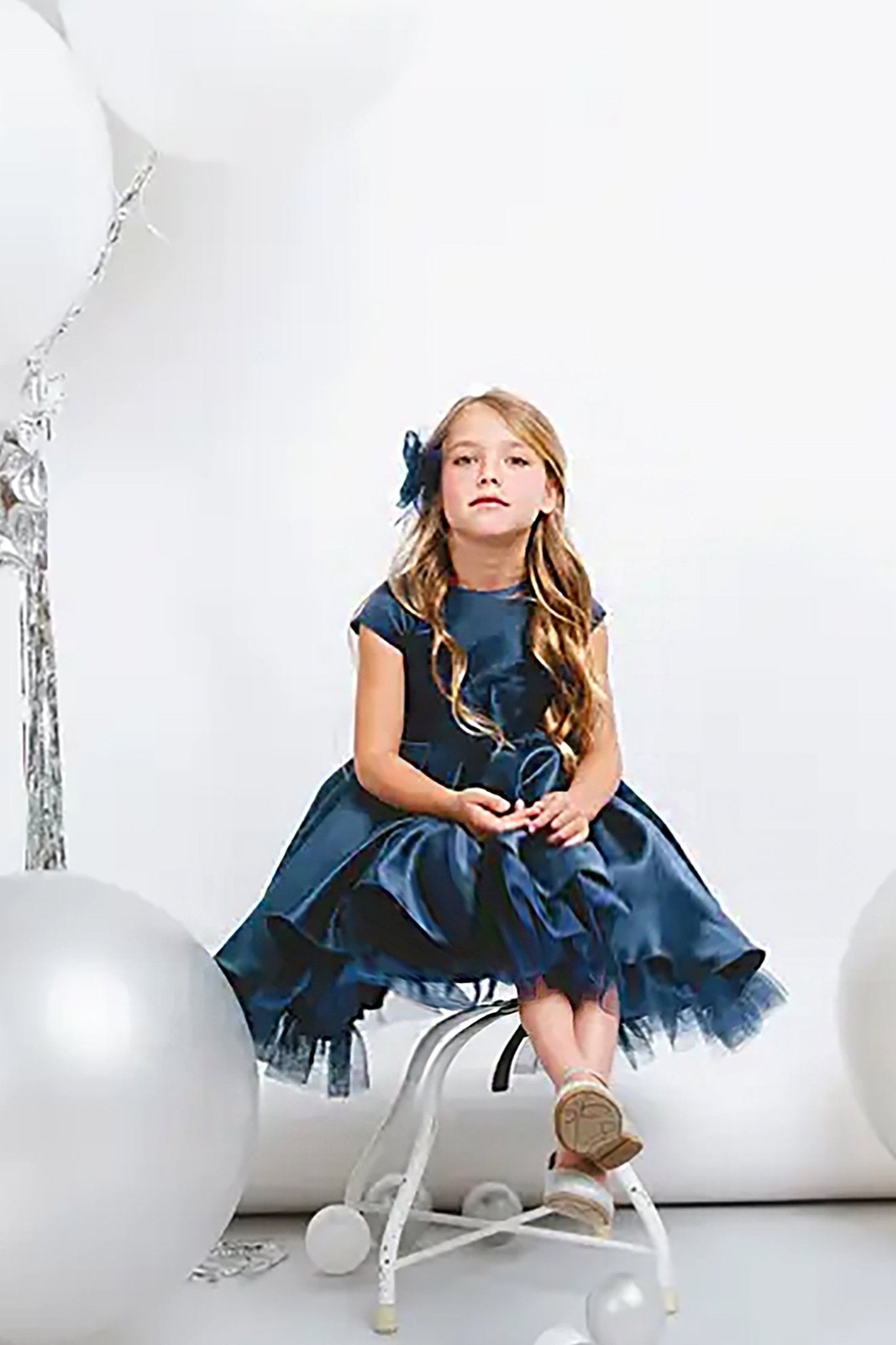 Front view of Navy Full Pleated Satin and Crystal Tulle flower girl dress with Detachable Bow.