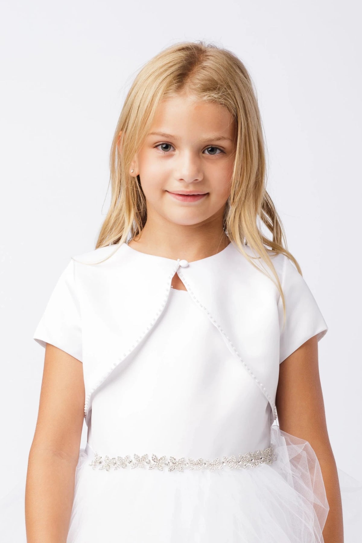 White satin bolero jacket with short sleeves and pearl trim.