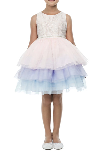 Young girl wearing a white lace top and pastel multicolor skirt on a white background
