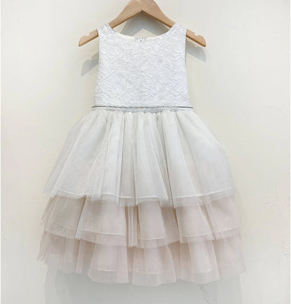 Hemline view highlights Ivory Multi-Layer Tutu lace flower girl dress with a layered tulle skirt.