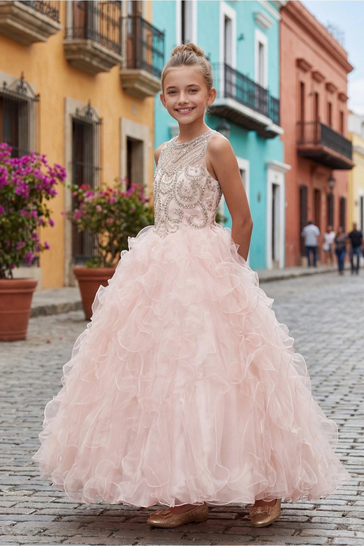 A Blush kids dress with beaded bodice and full ruffled skirt.