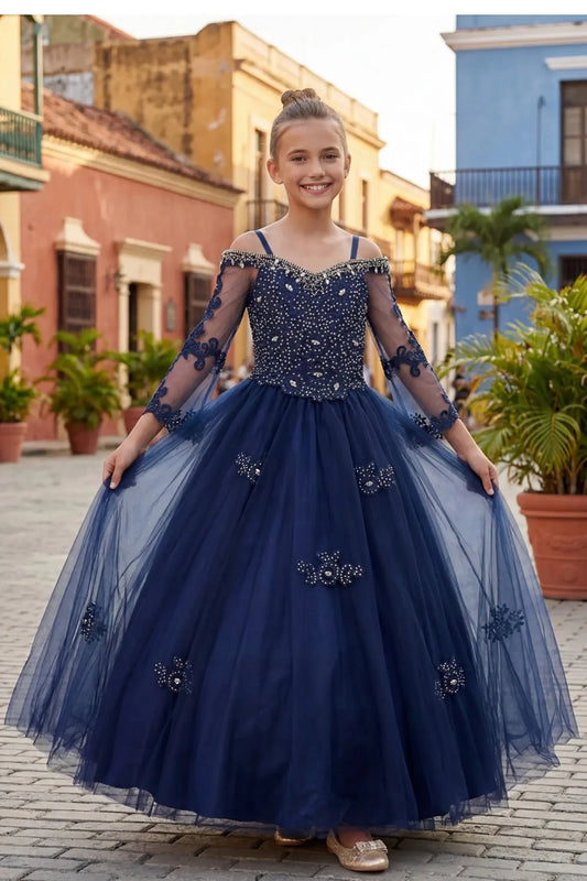 Front view of a navy kids mini quinceanera mini quince dress with off-shoulder rhinestone lace appliques, sheer long sleeves, and tulle skirt.