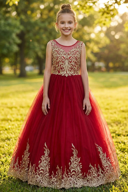 A Red kids dress with gold lace bodice and embroidered hem.