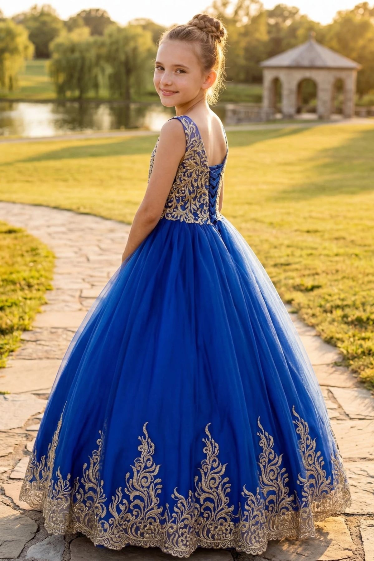 Featuring embroidered back above a tulle skirt, this is a Royal Blue kids dress.