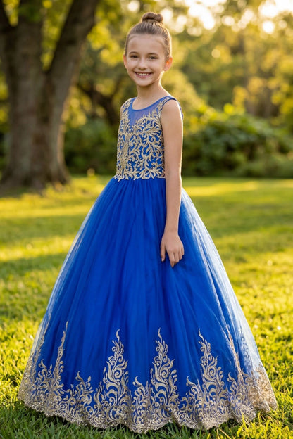 Details of the Royal Blue kids dress show gold embroidery above a flowing tulle skirt.