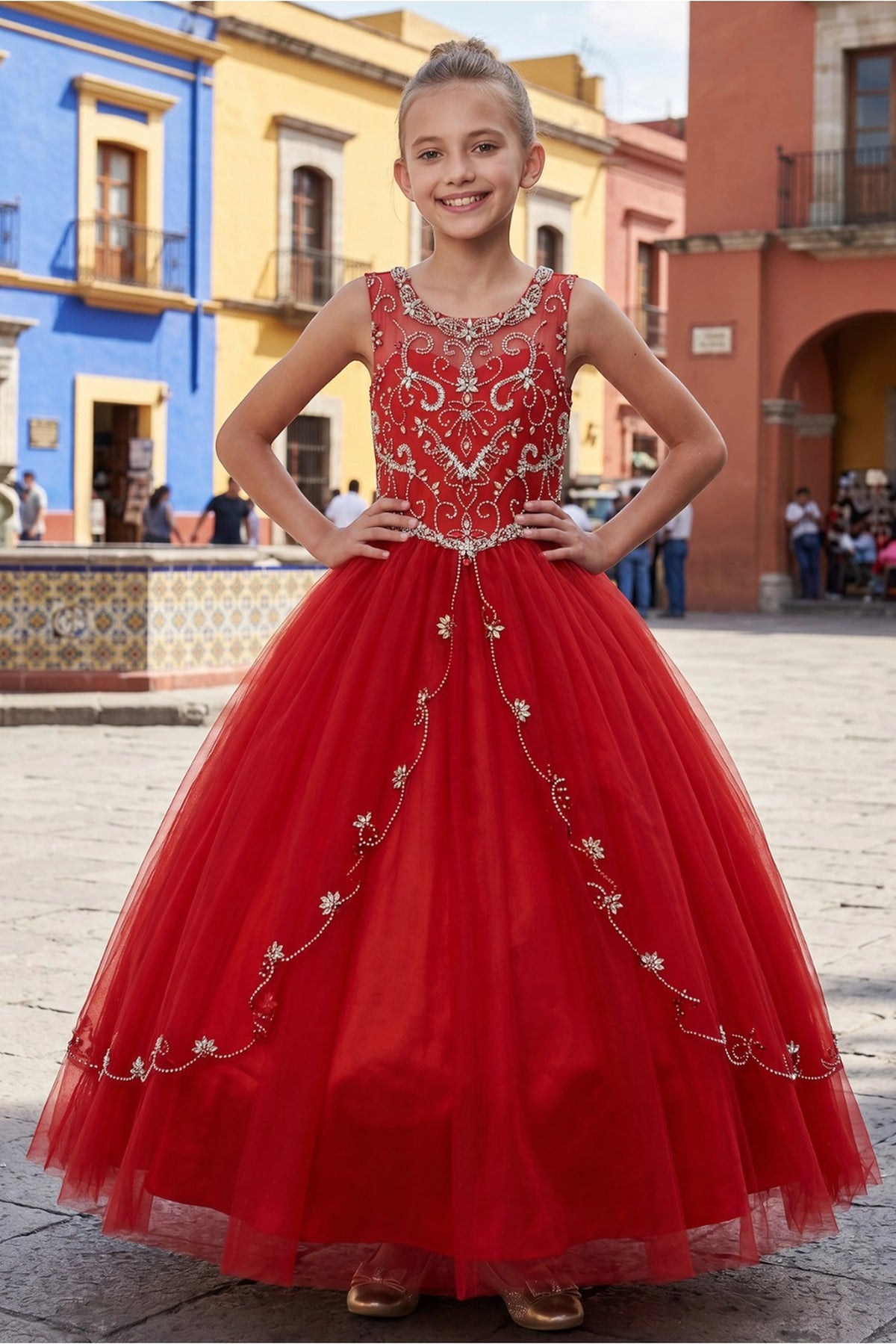 A Red kids dress with beaded bodice and floral skirt accents.