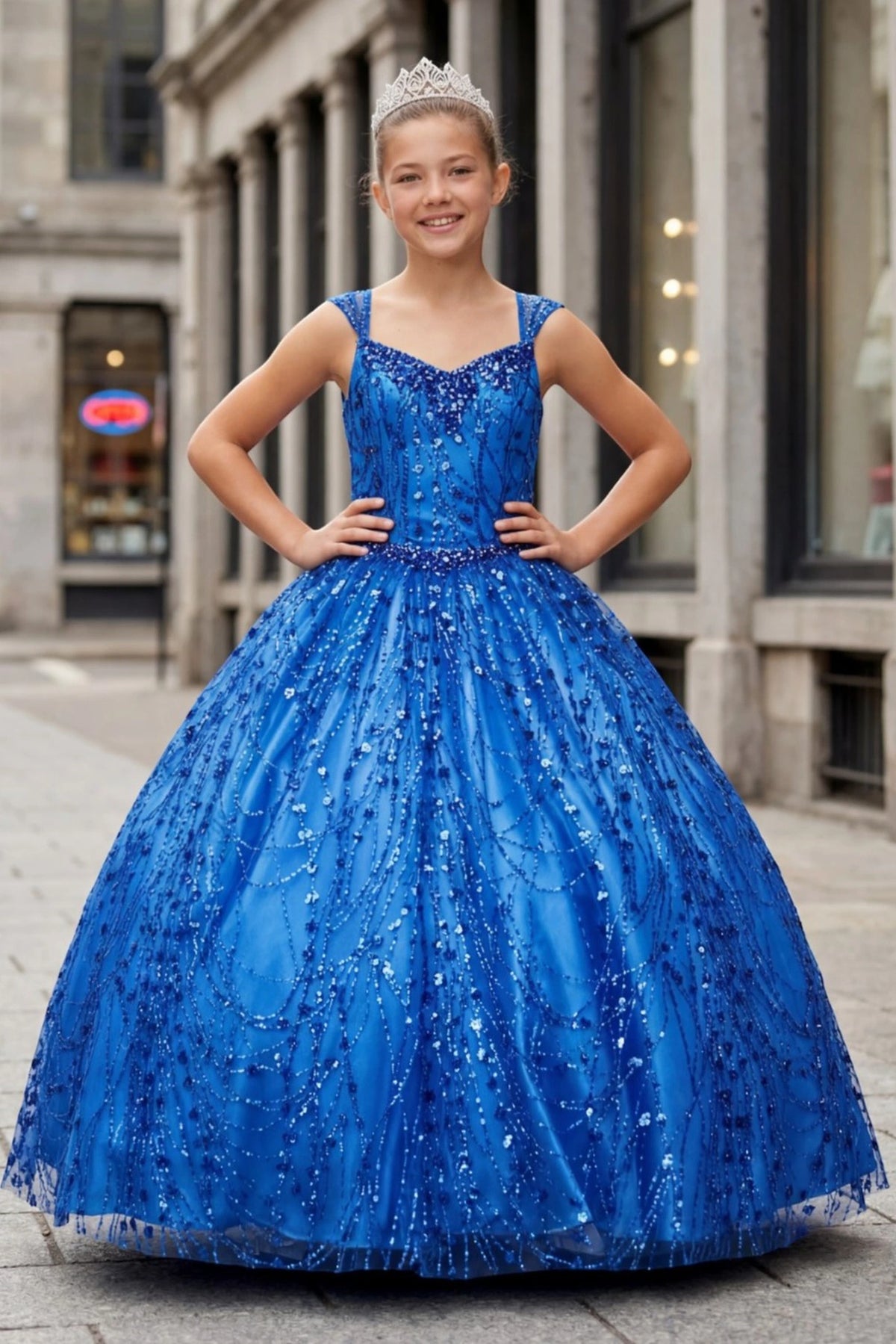 Royal Blue mini quince dress with a beaded bodice above a metallic glitter skirt.