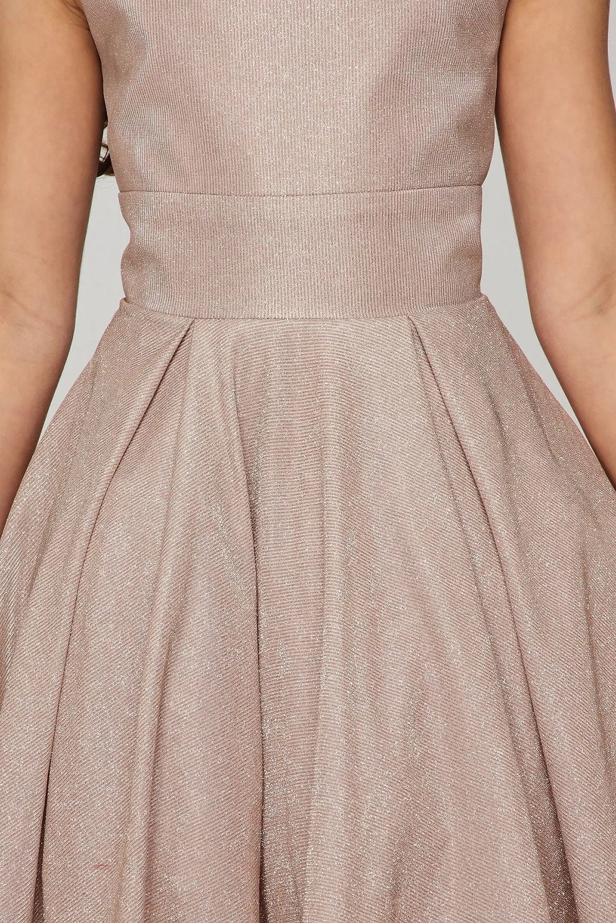 Accented metallic skirt pleats adds character to this Rose Gold kids party dress.