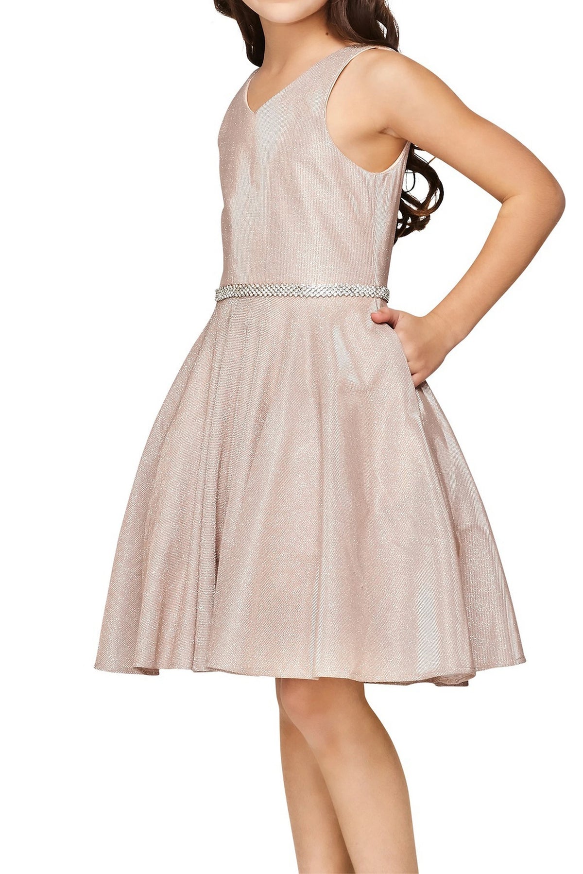 Detailed by a V-shaped back, the Rose Gold kids party dress reveals its construction.