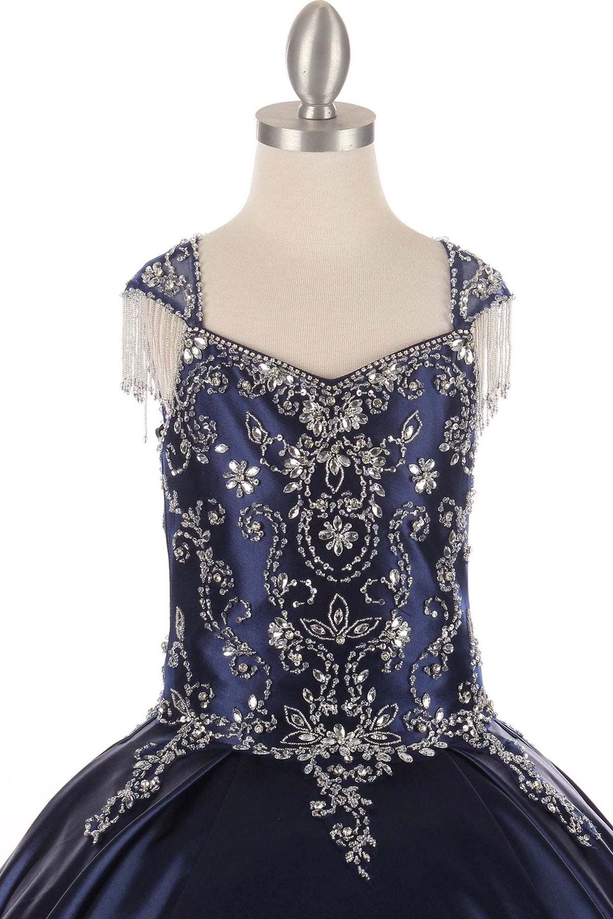 Embellishments on this Navy mini quince dress show sparkling crystals across the bodice.