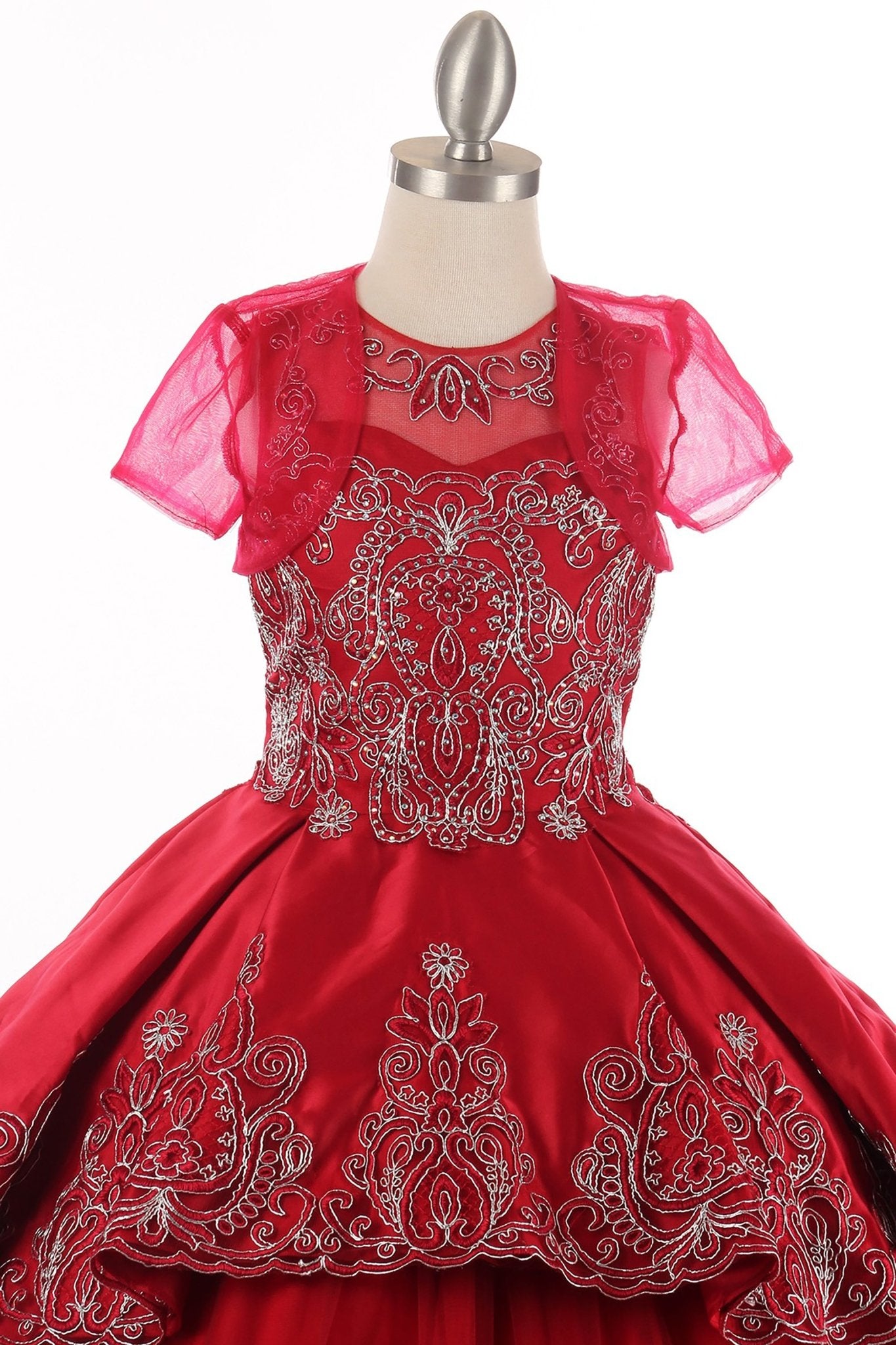 Burgundy top view kids mini quinceañera mini quince dress with metallic coiled embroidery, stone embellishments and sheer bolero.