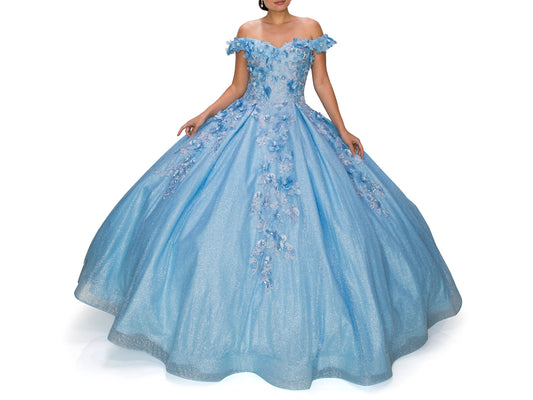 Blue Quinceanera | 6 Colors | 3D floral off-shoulder ball gown with glitter skirt, bottom pleated, corset back tie - front view of woman wearing dress with both hands on skirt