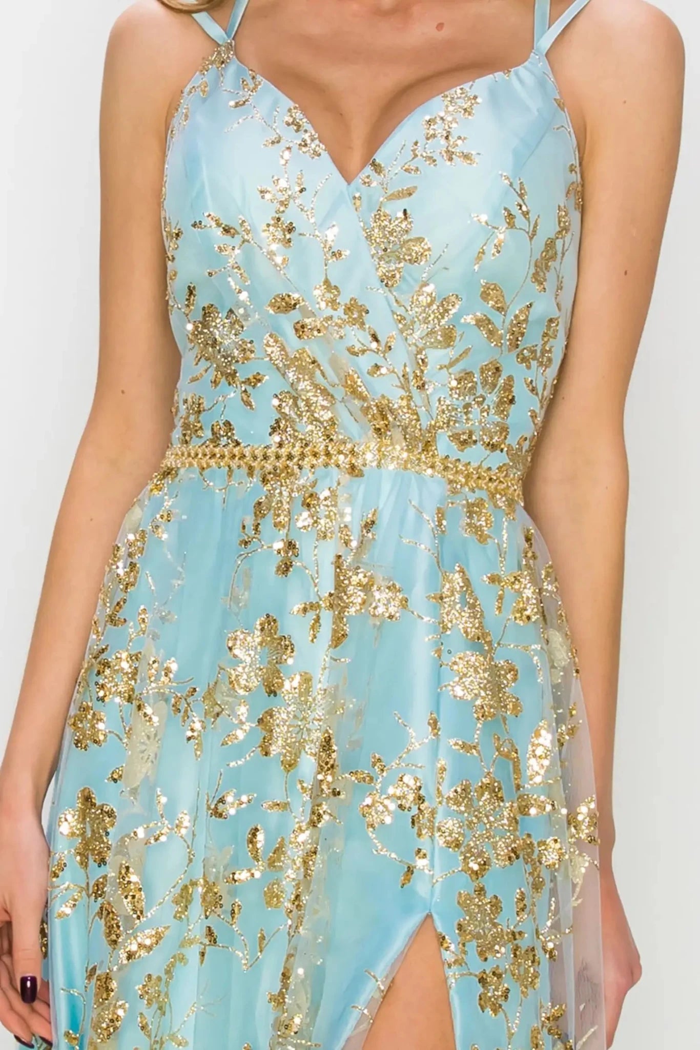 Close-up of blue floral glitter bodice with spaghetti straps and beaded belt.