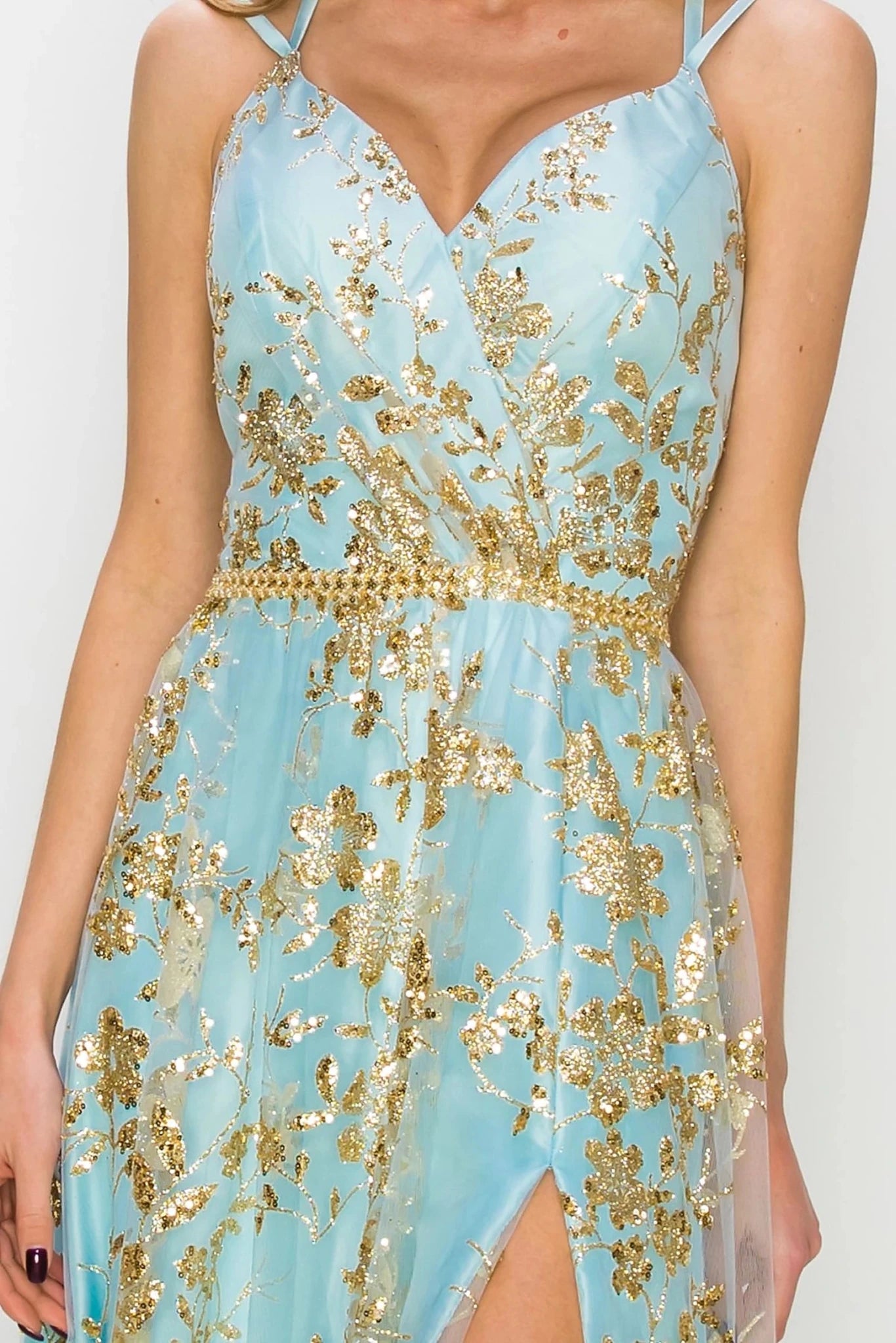 Blue evening dress with V-neckline framed by dual spaghetti straps