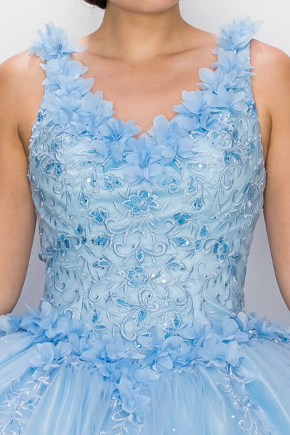 Zoomed front view of a blue quinceanera dress highlighting 3D floral appliques, beadwork bodice, and glitter embellishments
