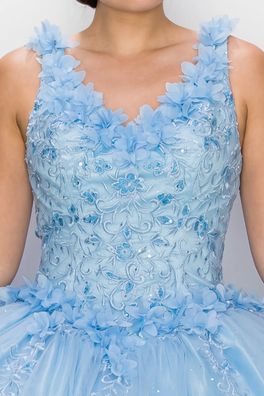 Zoomed front view of a blue quinceanera dress highlighting 3D floral appliques, beadwork bodice, and glitter embellishments