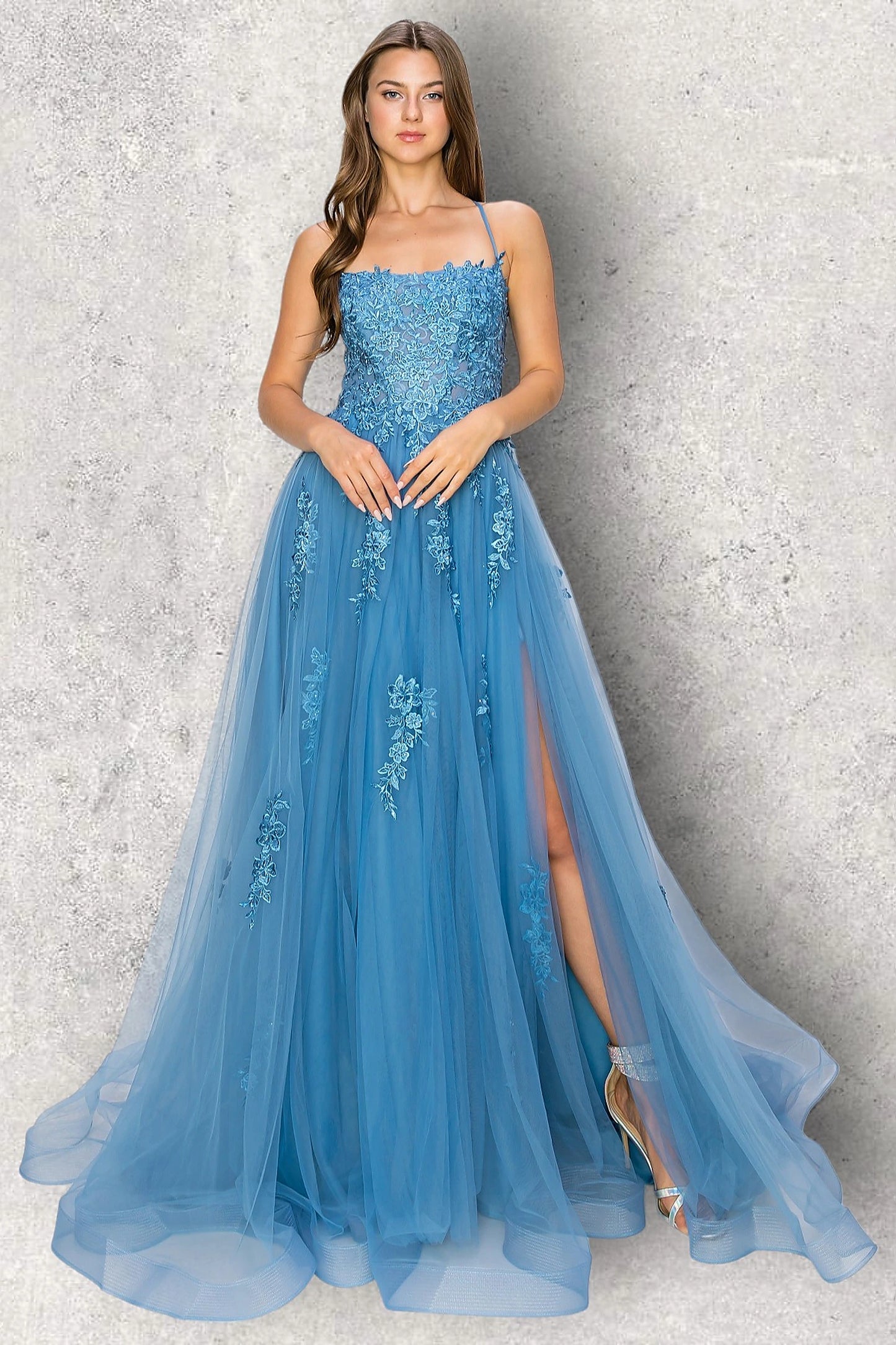 Dusty Blue evening dress showcasing thigh-high slit along skirt