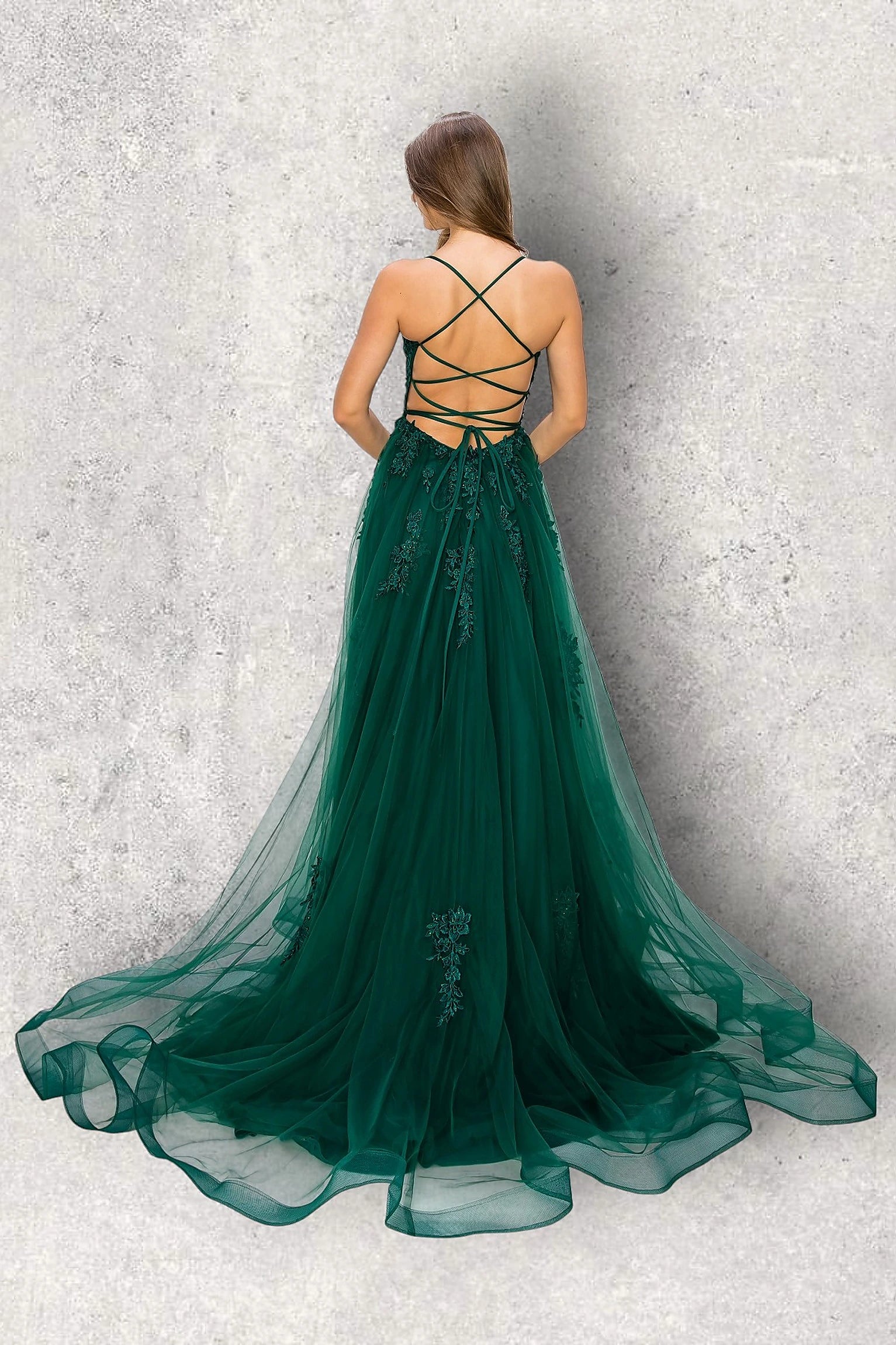 Hunter Green evening dress featuring thin straps and crisscross open back