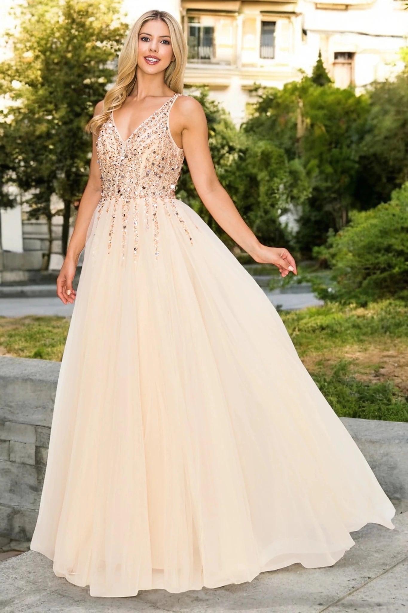Champagne evening dress featuring an open V-neckline design