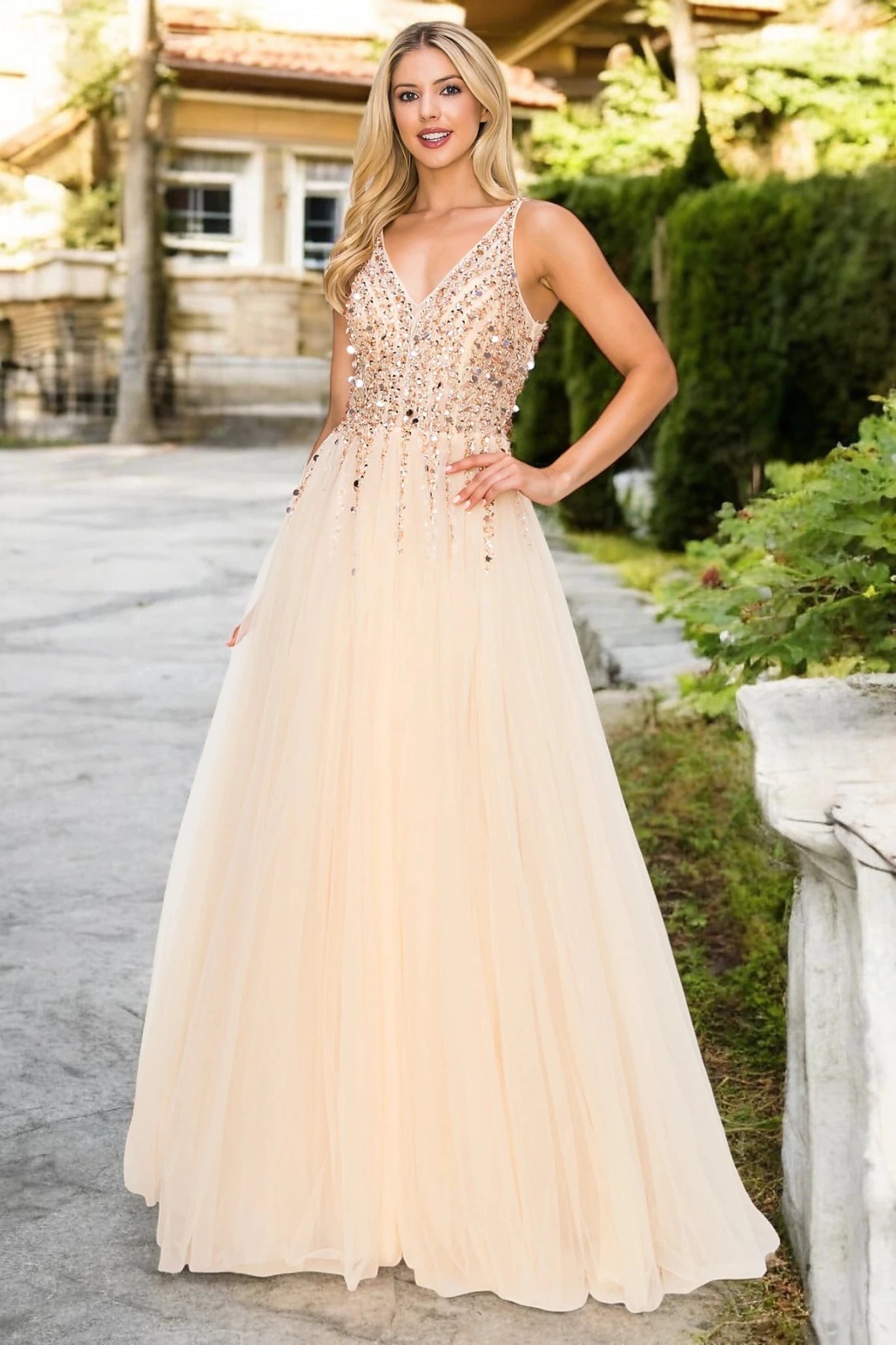 Champagne evening dress with sequin and tulle skirt.