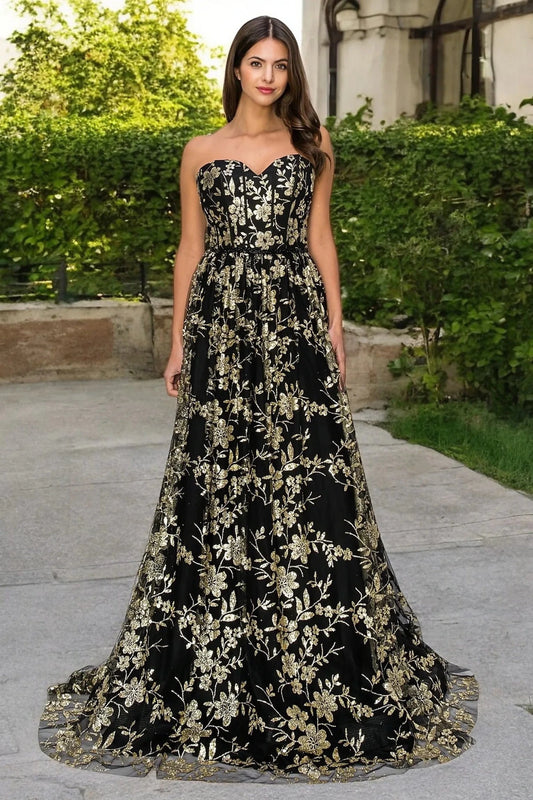 Bodice close-up highlights black evening dress with strapless sweetheart neckline.