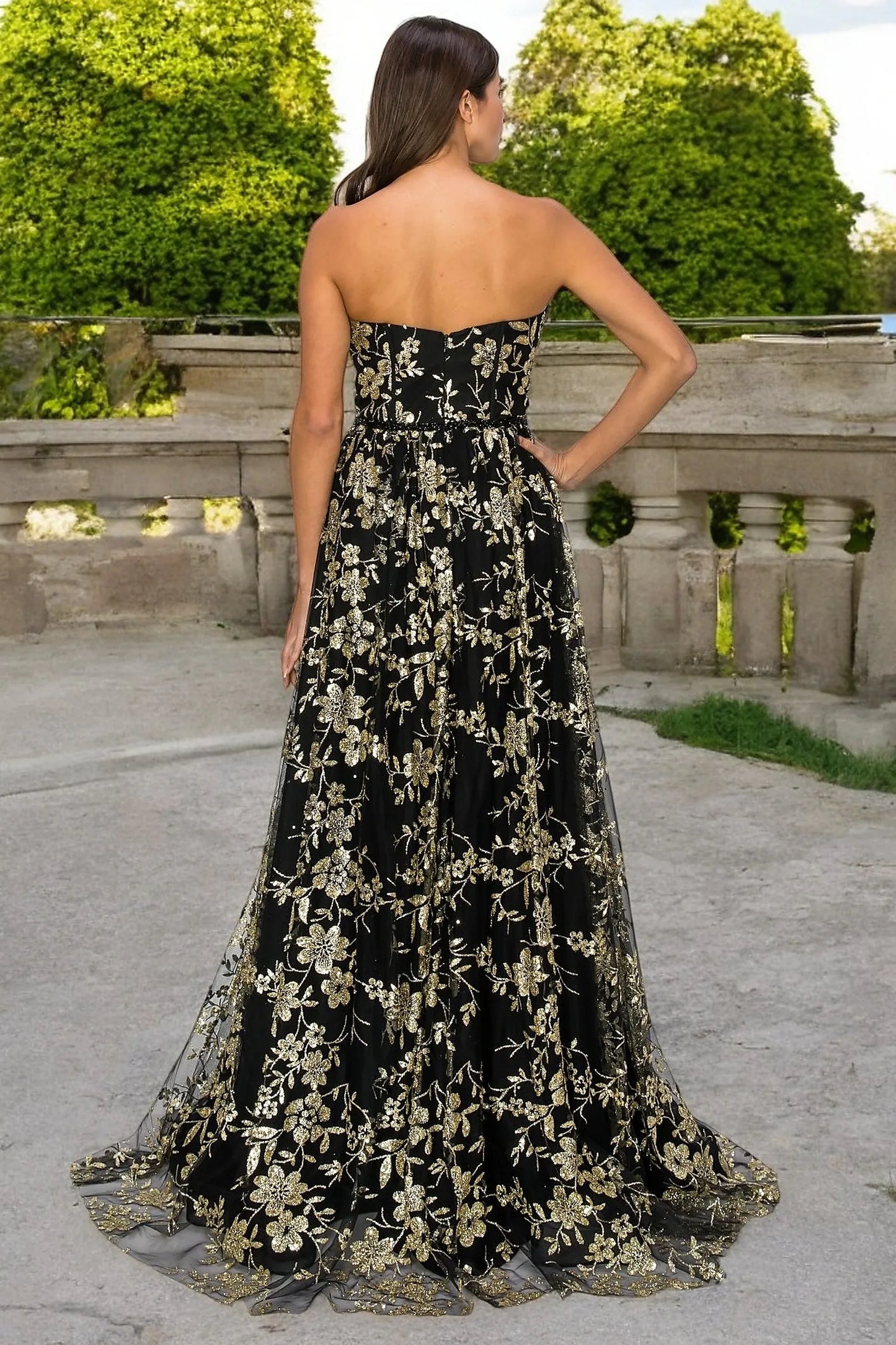 Black evening dress completed with zipper back closure for fitted finish