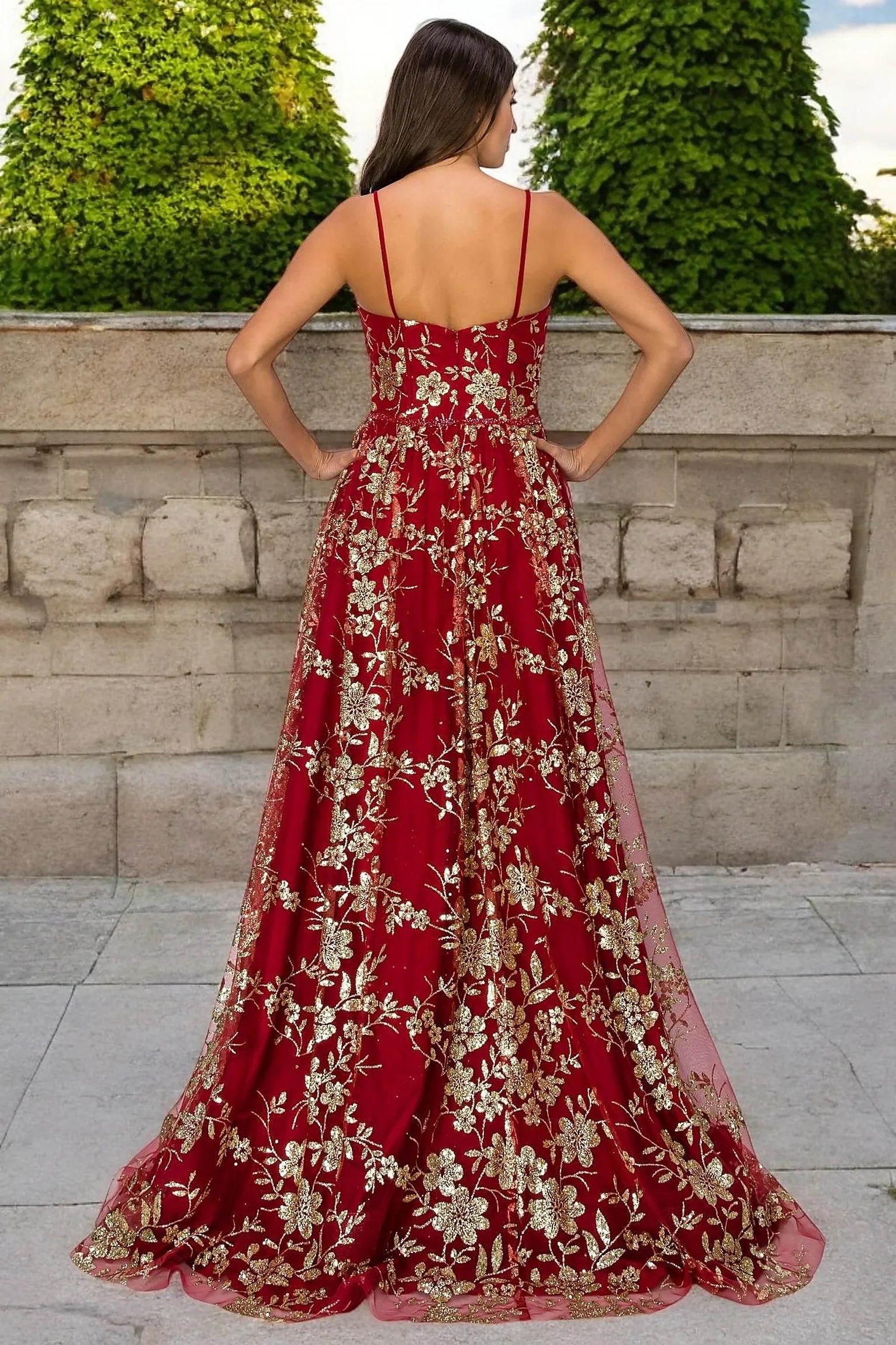 Burgundy evening dress completed with zipper back closure for fitted finish