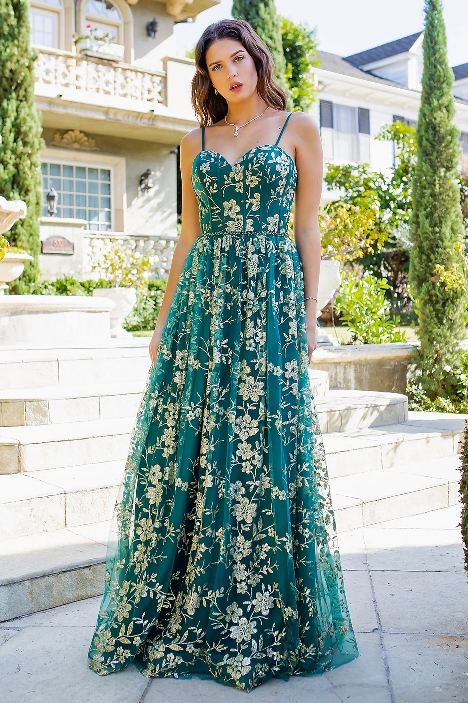 Green evening dress designed with removable spaghetti straps and full lining