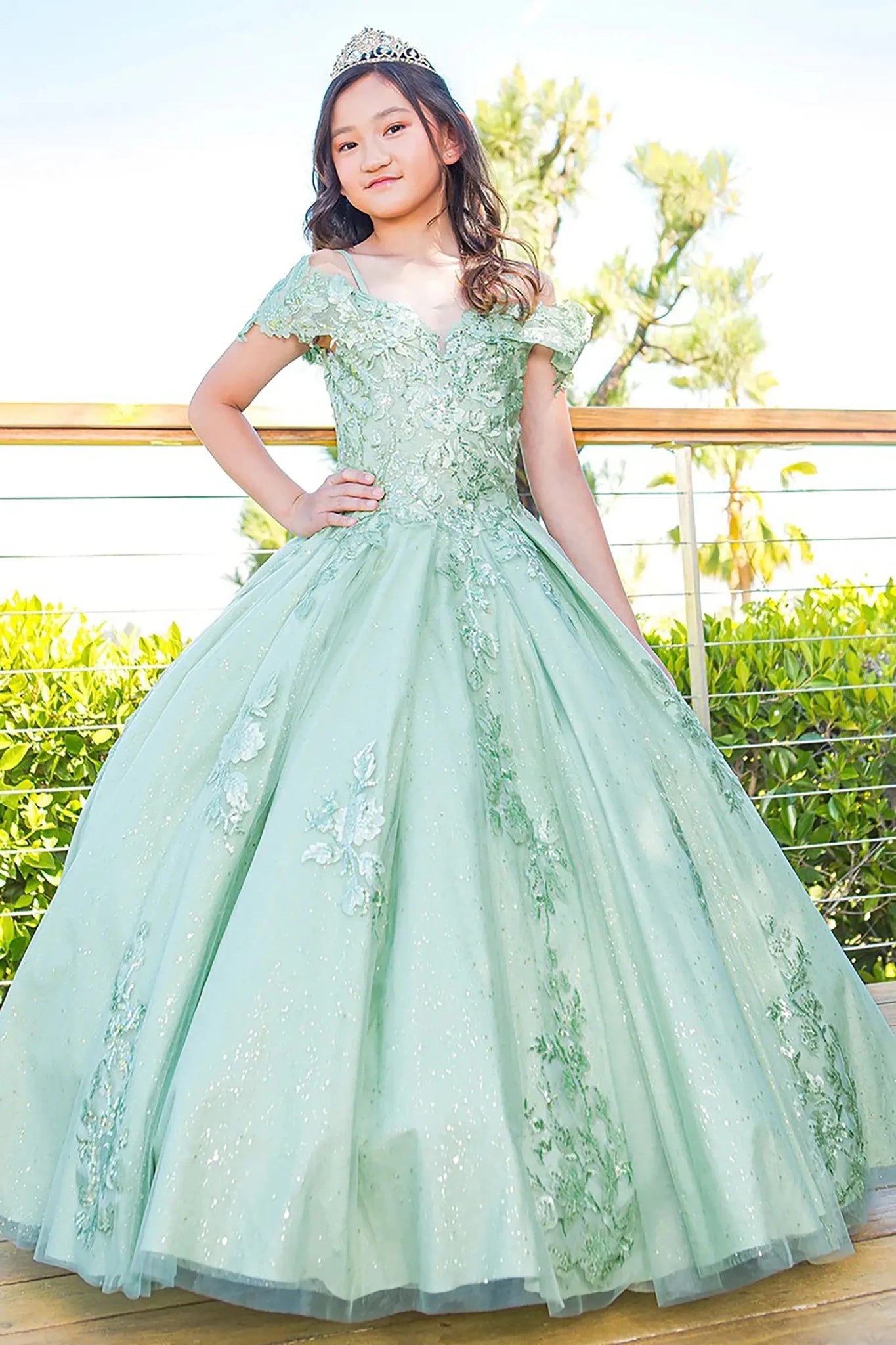 Sage front view kids mini quinceañera mini quince dress with sweetheart neckline, 3D floral sequin applique and glitter lace train.