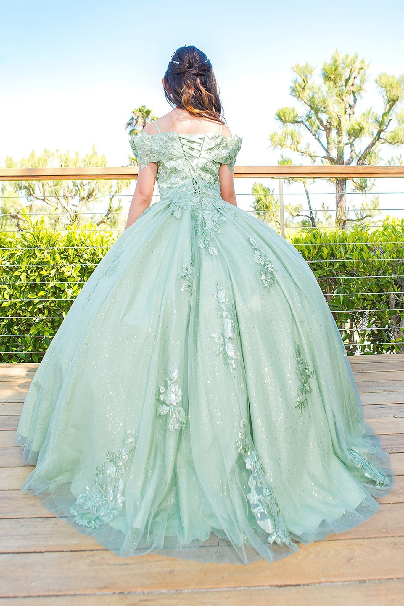 Sage back view kids mini quinceañera mini quince dress with sweetheart neckline, 3D floral sequin applique and glitter lace train.