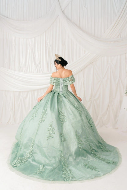 Displayed in a back view, the Sage quinceañera dress has lace-up back and floral lace trailing down the skirt.