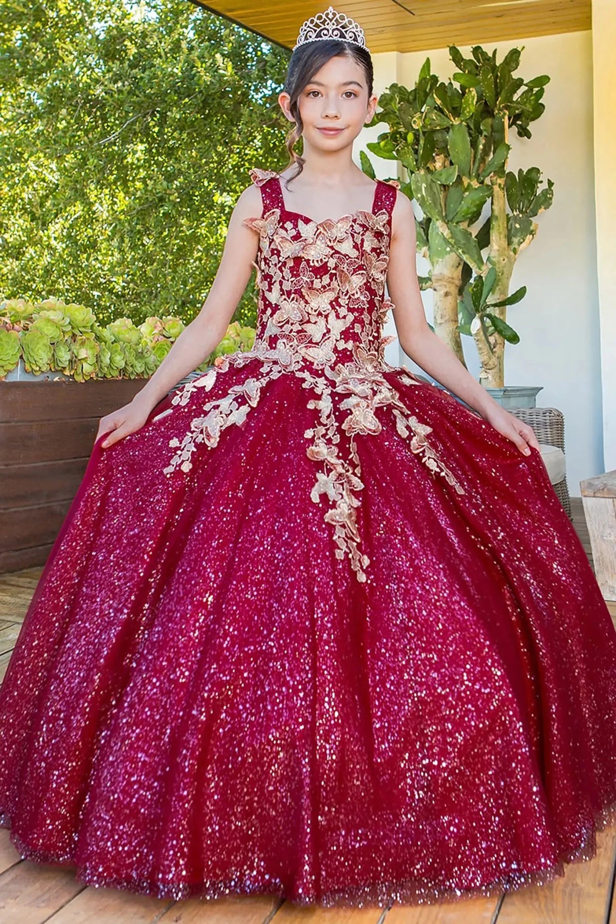 Front view of burgundy mini quince dress with metallic 3D butterfly glitter tulle skirt.