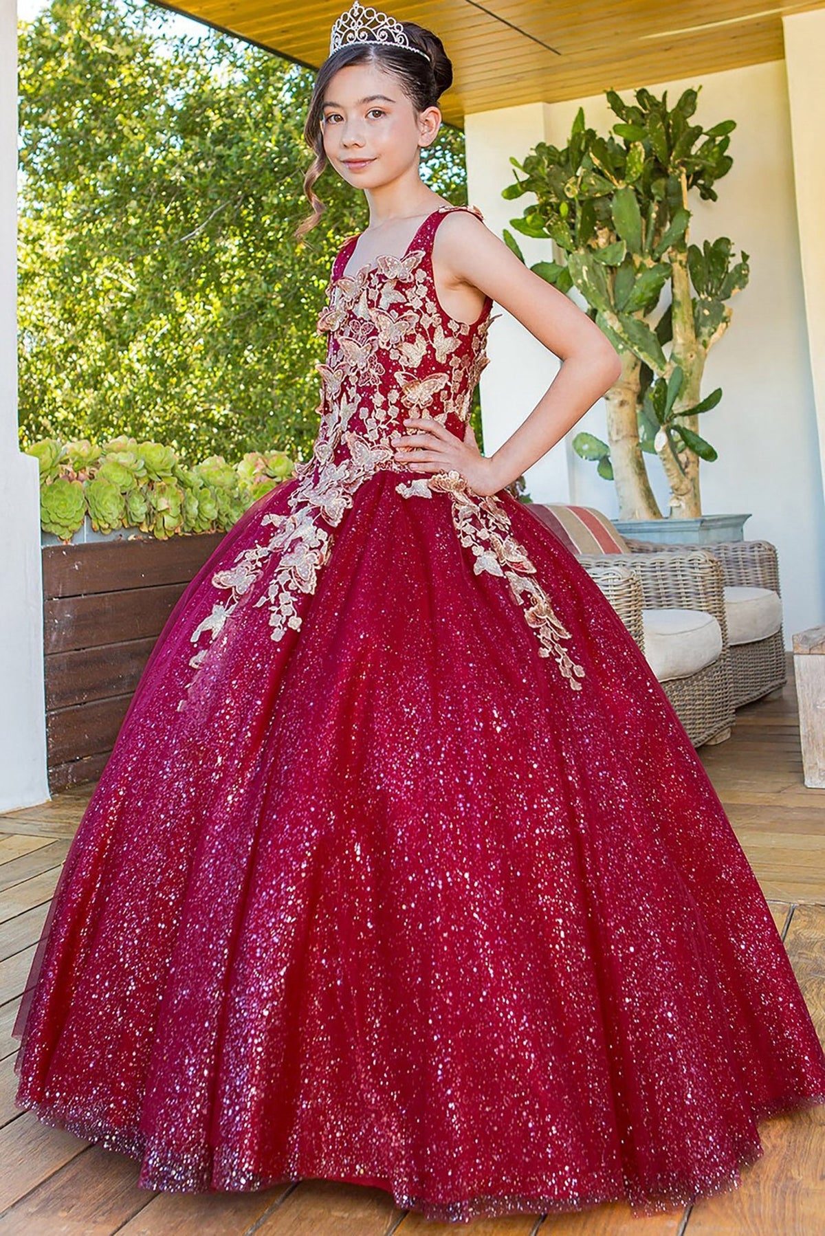 Burgundy mini quince dress with metallic 3D butterfly glitter tulle side view.