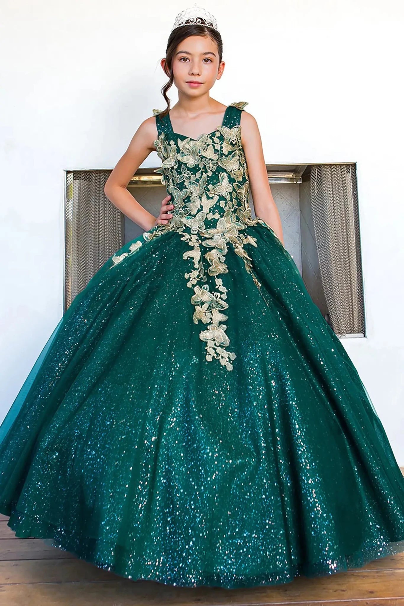 Front view of hunter green mini quince dress with metallic 3D butterfly glitter tulle fitted bodice and A-line skirt.
