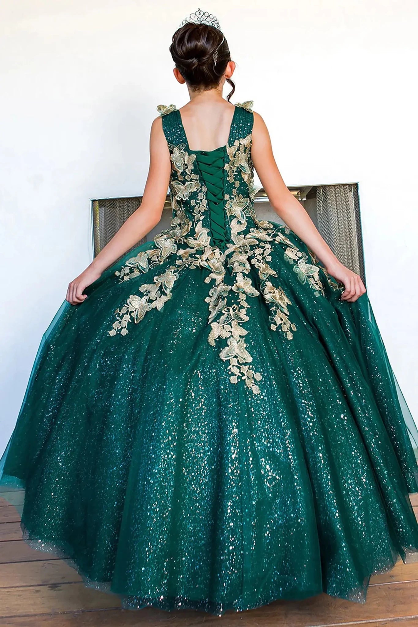 Hunter green mini quince dress with metallic 3D butterfly glitter tulle lace-up back detail.