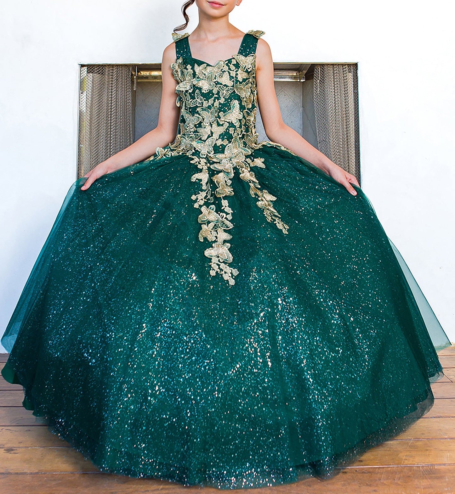 Hunter green mini quince dress with metallic 3D butterfly glitter tulle front detail.