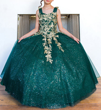 Kid wearing hunter green mini quince dress with metallic 3D butterfly glitter tulle front detail