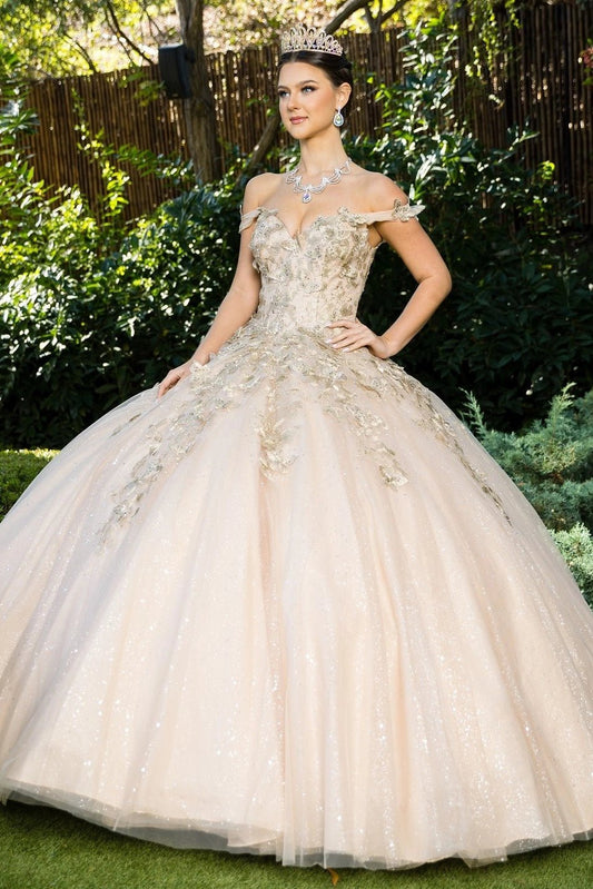 Shown in a front view, the Champagne quinceañera dress has off-shoulder neckline and gold butterfly appliques over the glitter ball skirt.