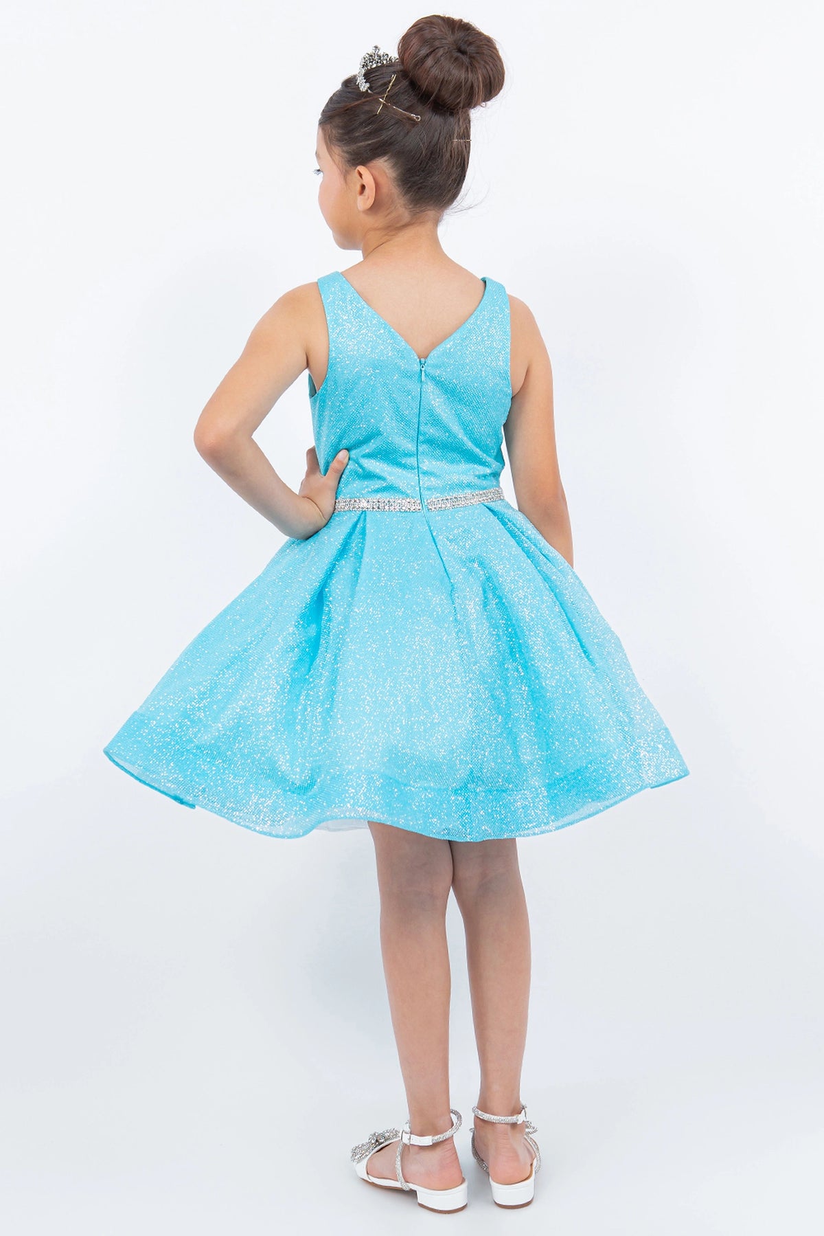 Finished details of a V-shaped back distinguish the Blue kids party dress.