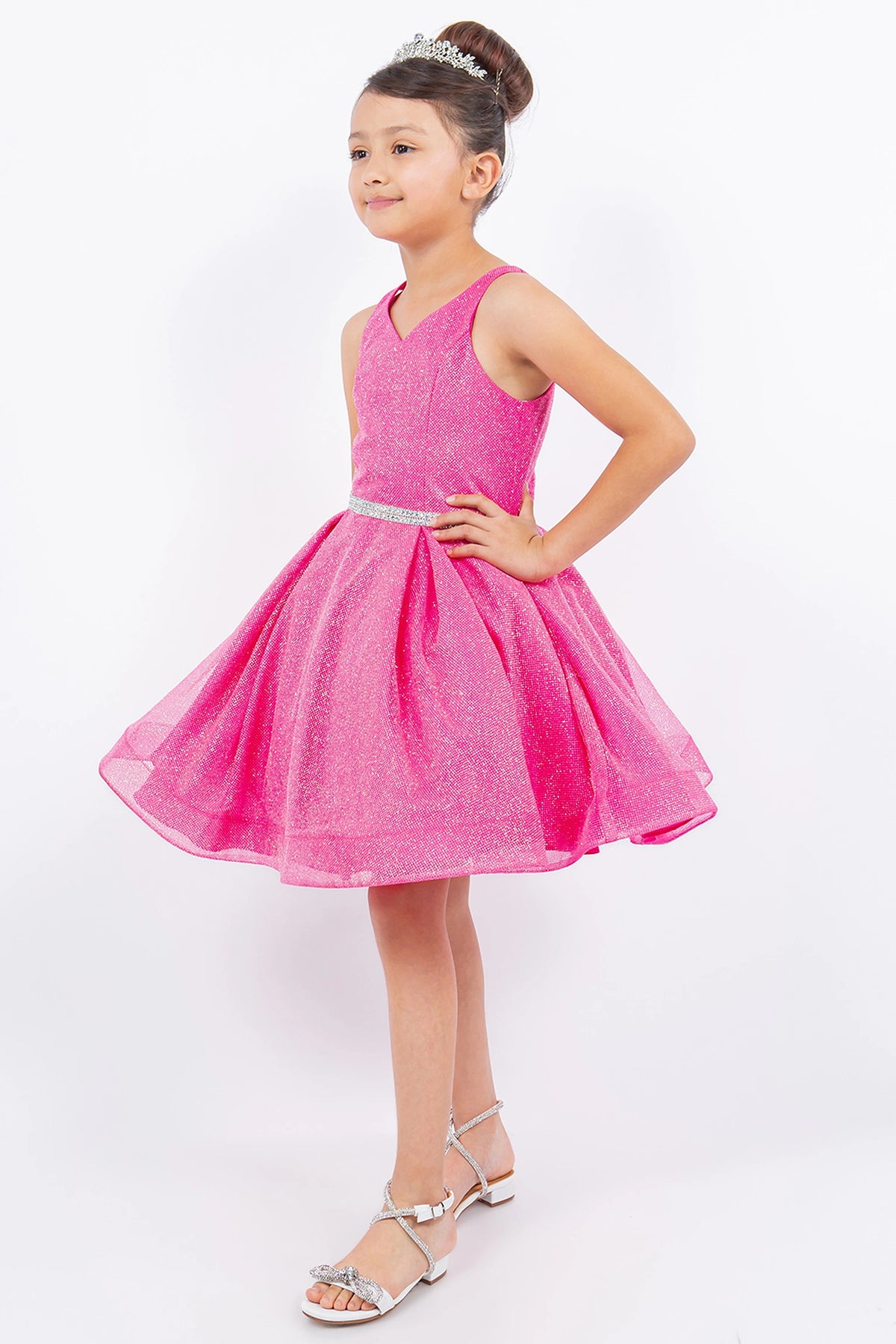 Shimmering mesh and a narrow jeweled belt highlight the Hot Pink kids dress.