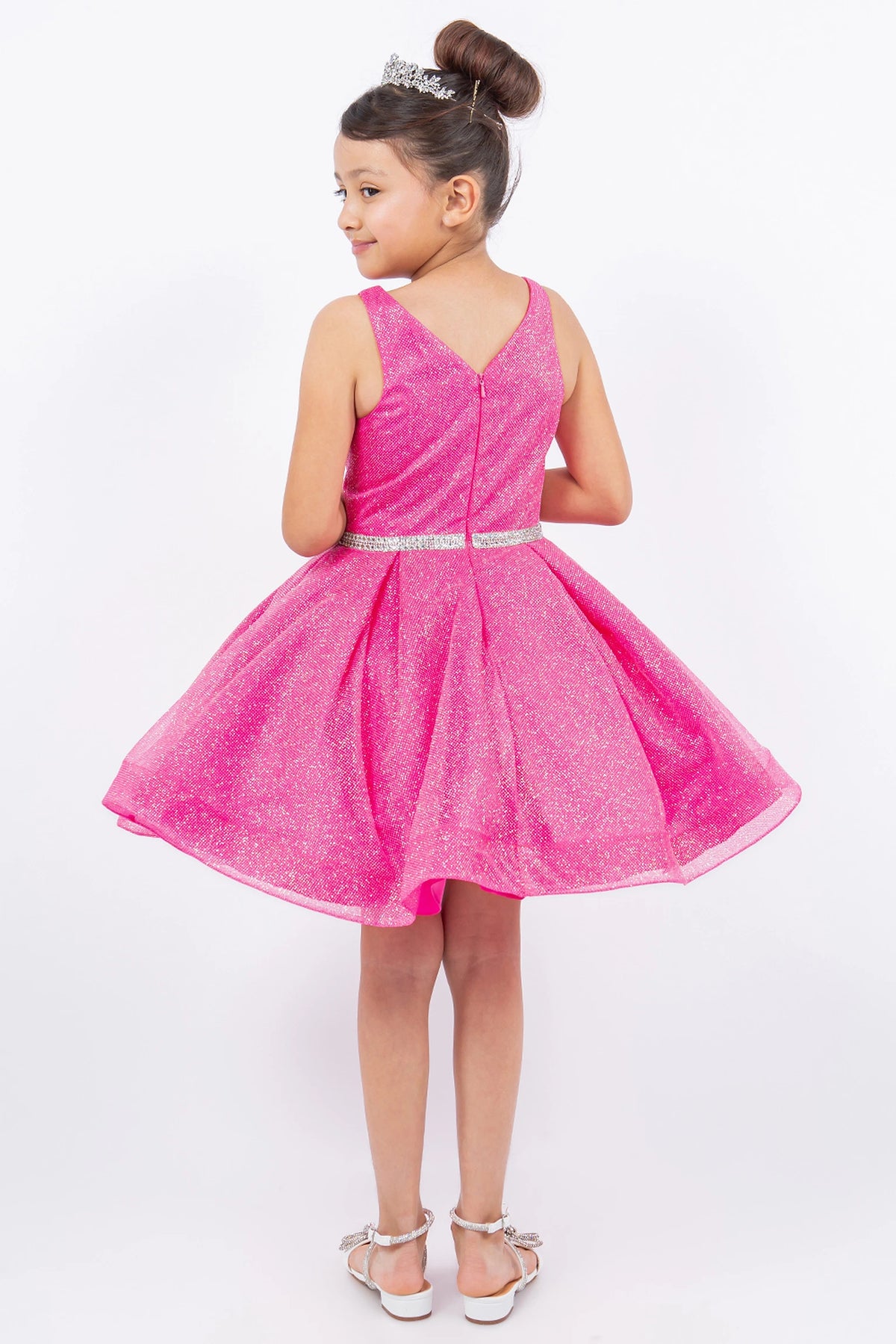 V-shaped back and a center zipper finish the Hot Pink kids dress.