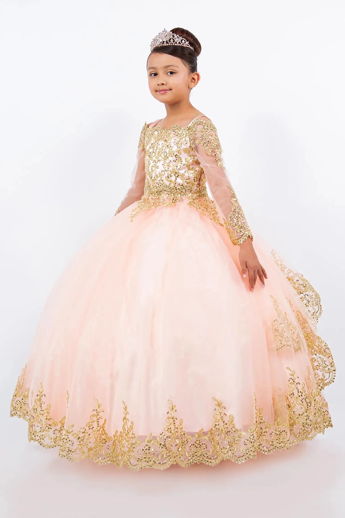Front view of blush mini quince dress with long sleeve off-shoulder glitter tulle and gold lace bodice.