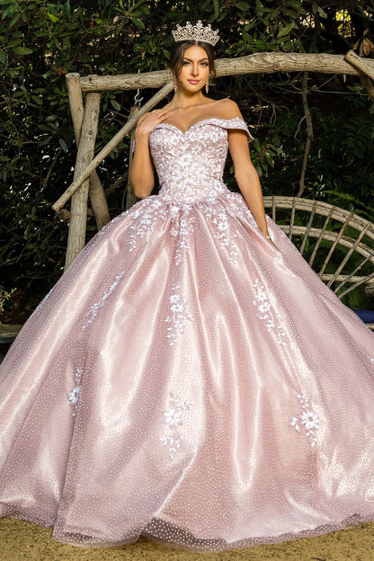 Quinceanera | Dusty Rose Off-Shoulder Sweetheart Embossed Tulle Satin Train Gown with Two-Tone Sequin Flower Appliqué - front view of woman wearing dress and crown with one hand on shoulder and one hand by side