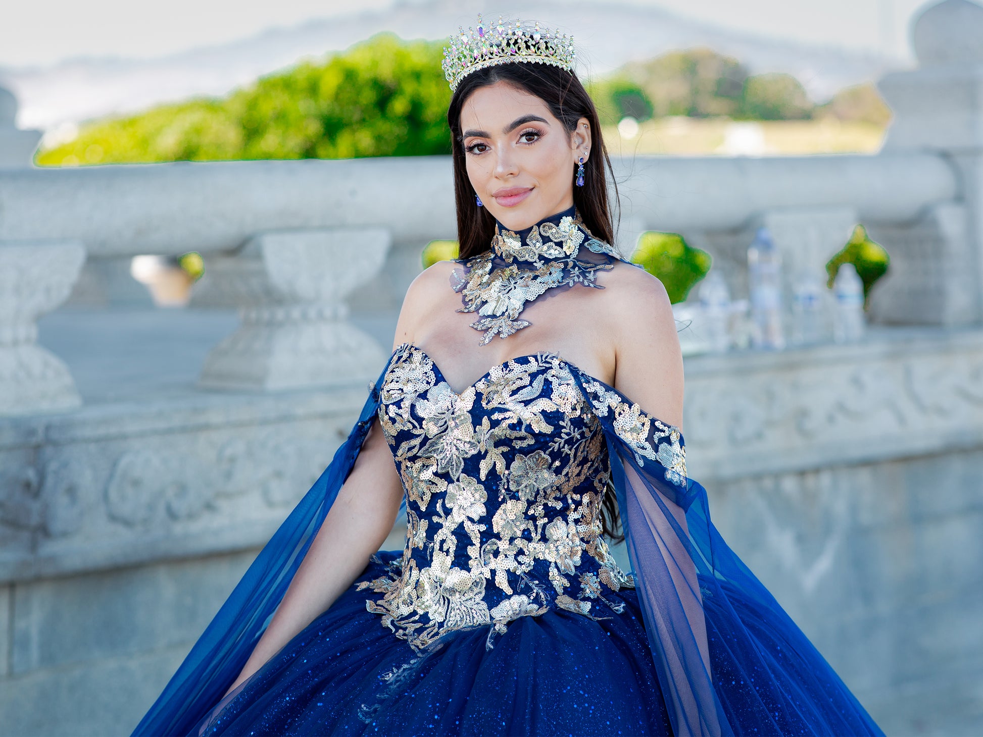 Quinceanera | Navy Off-Shoulder Ballgown Adorned with Golden Lace & Detachable Shoulder Train Sleeves | Renata J dress  | 3 Colors Available front zoom