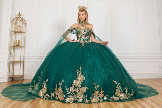 Shown in a front view, the Hunter Green quinceañera dress has gold lace bodice, sheer shoulder cape and floral skirt border.
