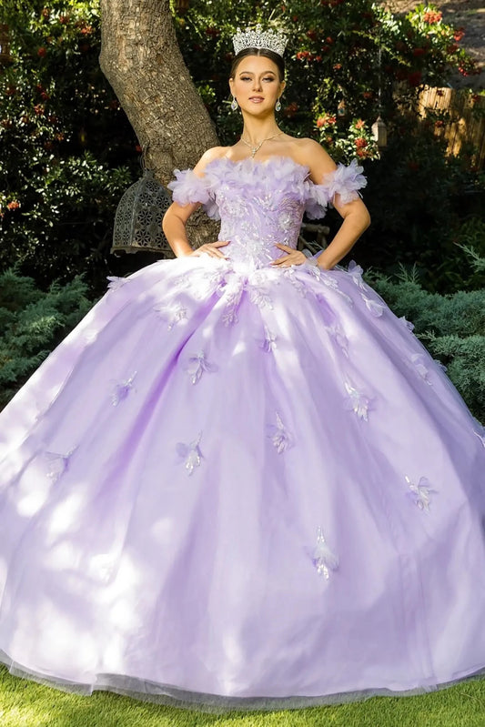 Front view of a woman wearing a lilac quinceanera dress with rainbow embroidery, sequin ruffle flowers, and crown detail
