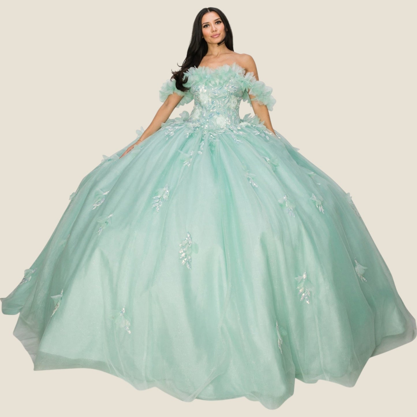 Detailed view of a woman wearing an aqua blue quinceanera dress with rainbow embroidery, sequin ruffle flowers, and off-shoulder design