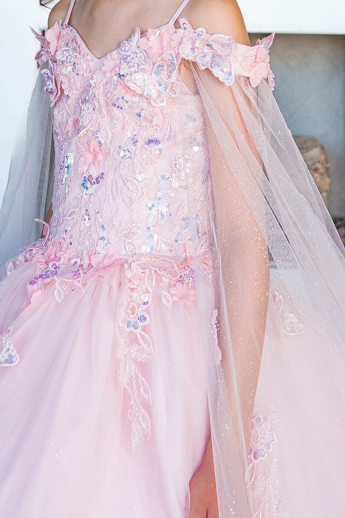 Blush mini quince dress with 3D butterfly applique detachable sleeves glitter tulle skirt detail.