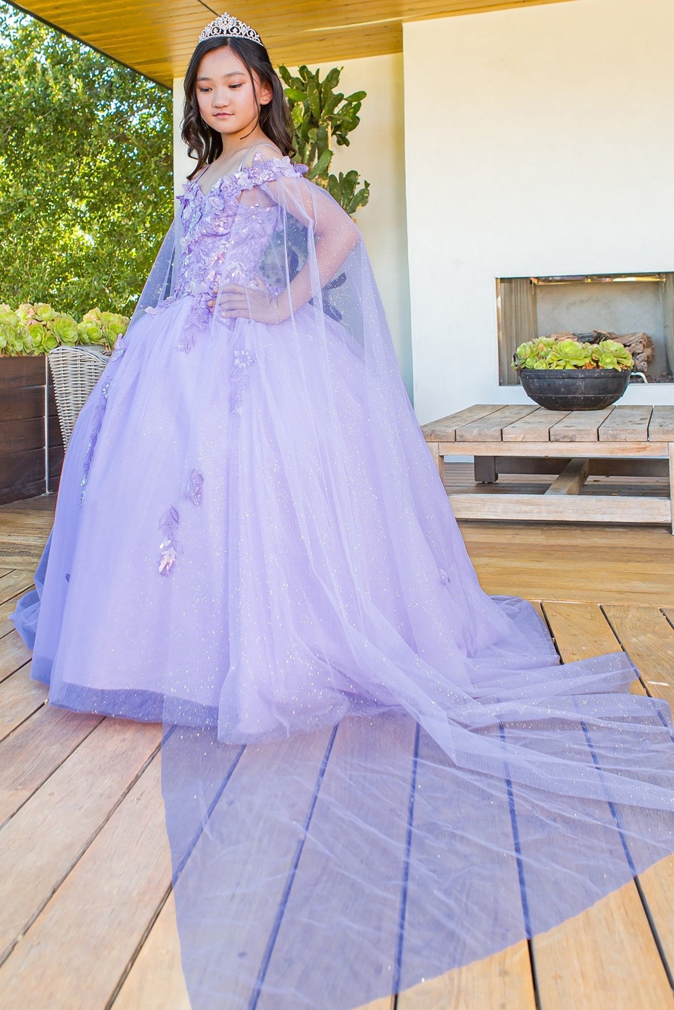 Kid wearing lilac mini quince dress with 3D butterfly applique detachable sleeves glitter tulle skirt